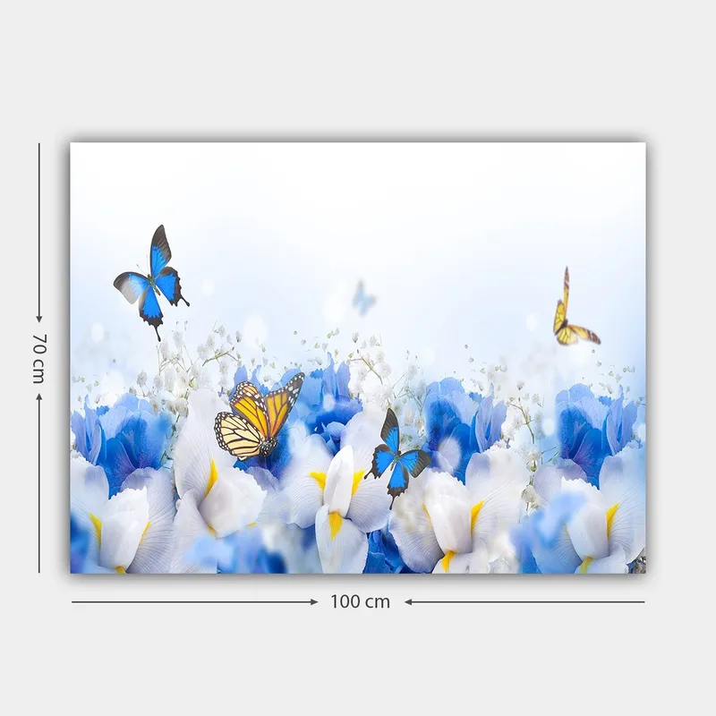 Canvas taulu 70x100 cm - Värikäs sommitelma perhosista, jotka leijuvat valkoisten ja sinisten kukkien yllä - Sininen / Valkoinen / Keltainen - Sisustustuotteet - Taulu & taide - Canvas-taulu