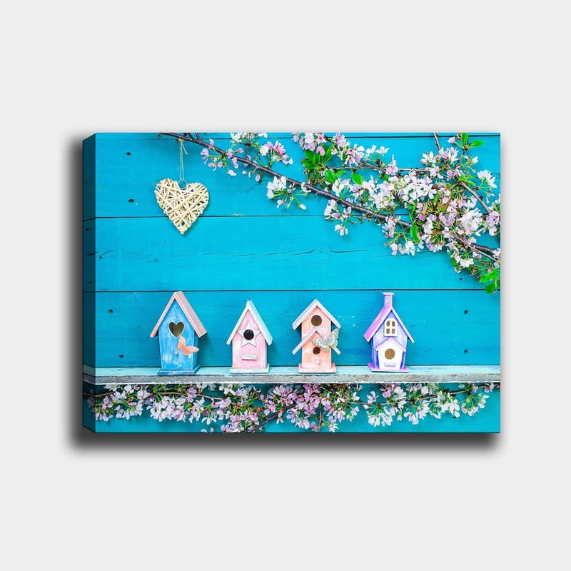 Canvas taulu 70x100 cm - Värikkäät linnunpöntöt sinisellä pohjalla ja kukat koristeena - Sininen / Vaaleanpunainen / Valkoinen - Sisustustuotteet - Taulu & taide - Canvas-taulu