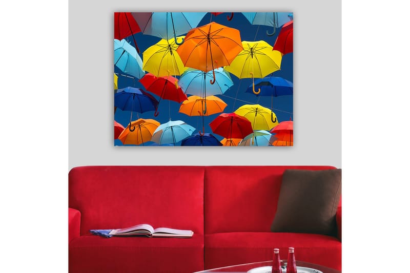 Canvas taulu 70x100 cm - Värikkäät sateenvarjot leijuvat ilmassa, Punainen / Sininen / Keltainen