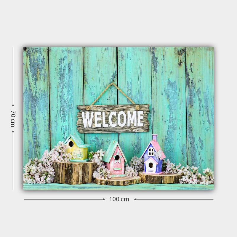 Canvas taulu 70x100 cm - Värikkäitä linnunpönttöjä viihtyisässä ympäristössä puisella kyltillä - Turkoosi / Vaaleanpunainen / Keltainen - Sisustustuotteet - Taulu & taide - Canvas-taulu