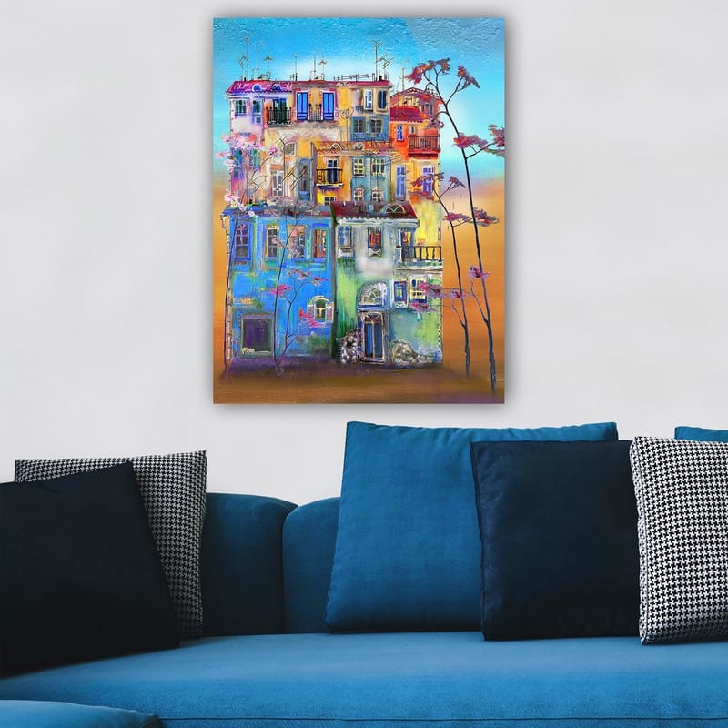 Canvas taulu 70x100 cm - Värikkäitä taloja kaupunkiympäristössä kukkivien puiden etualalla - Sininen / Vihreä / Oranssi - Sisustustuotteet - Taulu & taide - Canvas-taulu