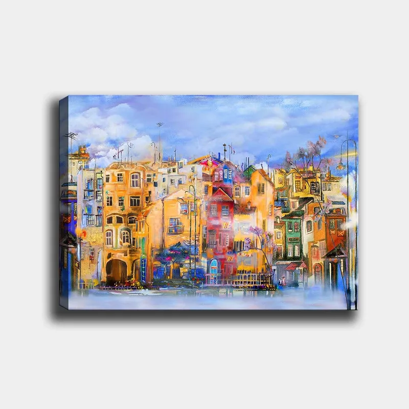 Canvas taulu 70x100 cm - Värikkäitä taloja veden äärellä vilkkaassa kaupunkiympäristössä, Keltainen / Punainen / Sininen