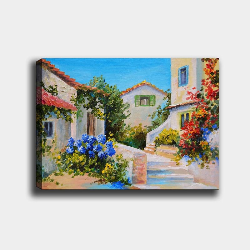 Canvas taulu 70x100 cm - Viehättävä kylämaisema värikkäine taloineen ja kukkivine kasveineen, Sininen / Vihreä / Keltainen