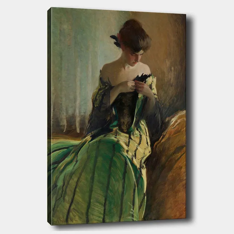 Canvas taulu 70x100 cm - Vihreämekkoinen nainen istuu ja työskentelee käsissään jonkin kanssa, syvissä mietteissä., Vihreä / Musta / Beige