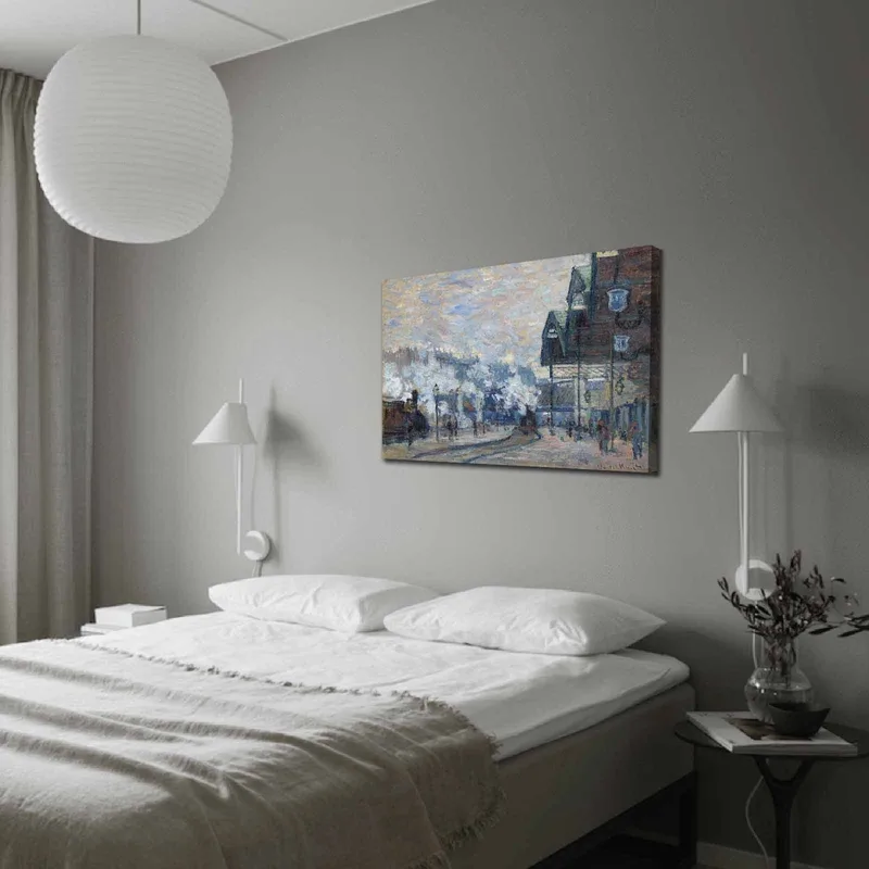 Canvas taulu 70x100 cm - Vilkas kaupunkikuva, jossa ihmisiä ja rakennuksia talvisessa ympäristössä, Sininen / Harmaa / Valkoinen