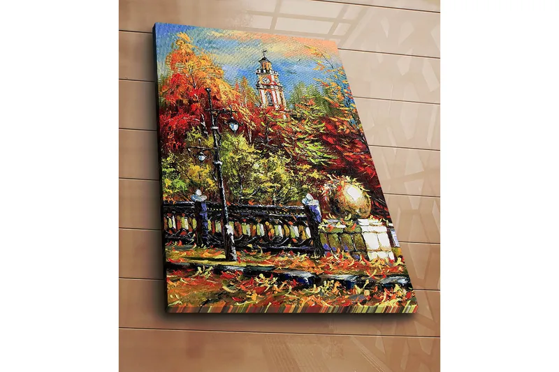 Canvas taulu 70x100 cm - Vilkas syysmaisema, taustalla kellotorni värikkäiden puiden ja valojen ympäröimänä - Punainen / Oranssi / Vihreä - Sisustustuotteet - Taulu & taide - Canvas-taulu