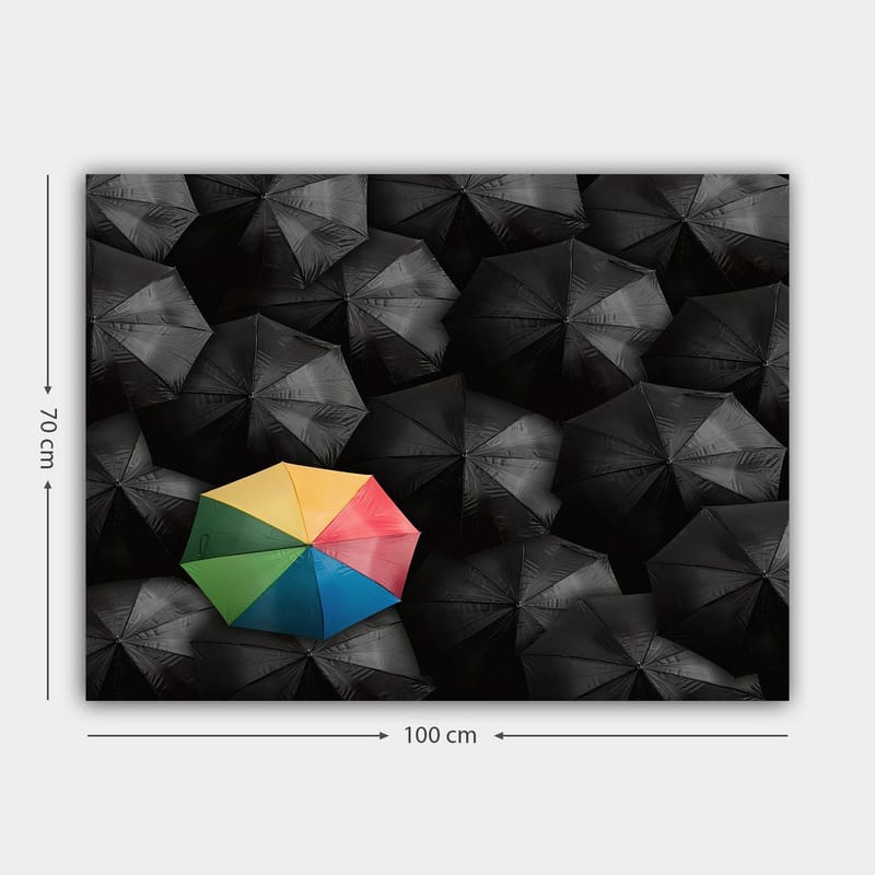 Canvas taulu 70x100 cm - Yksinäinen värikäs sateenvarjo lukuisten mustien sateenvarjojen joukossa - Musta / Keltainen / Punainen - Sisustustuotteet - Taulu & taide - Canvas-taulu