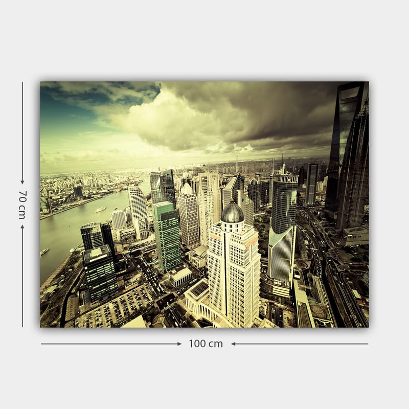 Canvas taulu 70x100 cm - Panoraamanäkymä modernista kaupungista korkeine pilvenpiirtäjineen ja maiseman läpi virtaava jokineen - Vihreä / Harmaa / Beige - Sisustustuotteet - Taulu & taide - Canvas-taulu