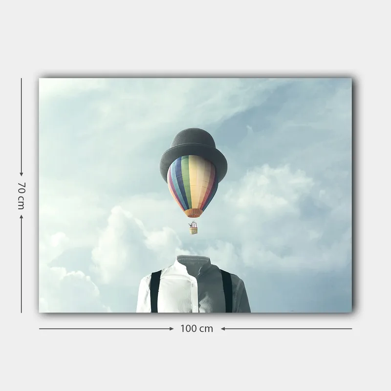 Canvas taulu 70x100 cm - Päätön mies valkoisessa paidassa ja mustassa hatussa, värikäs kuumailmapallo leijumassa yläpuolella - Valkoinen / Musta / Sateenkaari - Sisustustuotteet - Taulu & taide - Canvas-taulu