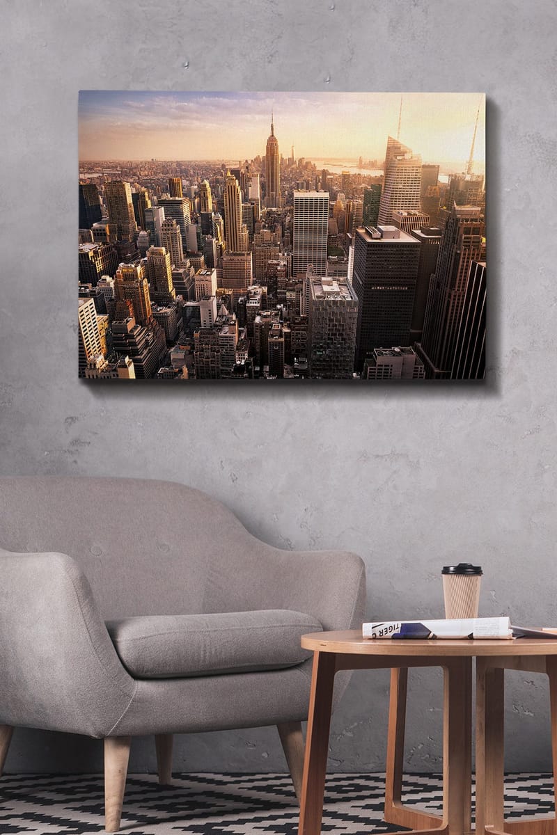 Canvas taulu 70x100 cm - Panoraamanäkymä kaupunkiin pilvenpiirtäjineen ja ikoniseen Empire State Buildingiin auringonlaskun aikaan - Kulta / Harmaa / Sininen - Sisustustuotteet - Taulu & taide - Canvas-taulu
