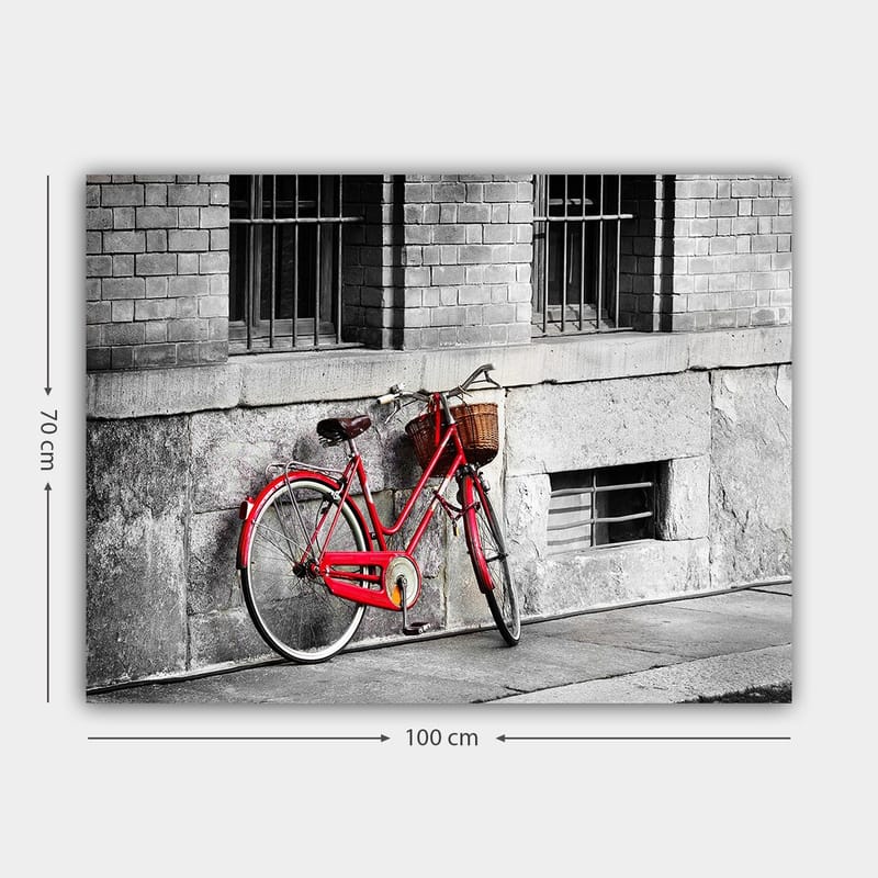 Canvas taulu 70x100 cm - Punainen polkupyörä nojaa harmaata seinää vasten kaupunkiympäristössä - Punainen / Harmaa - Sisustustuotteet - Taulu & taide - Canvas-taulu