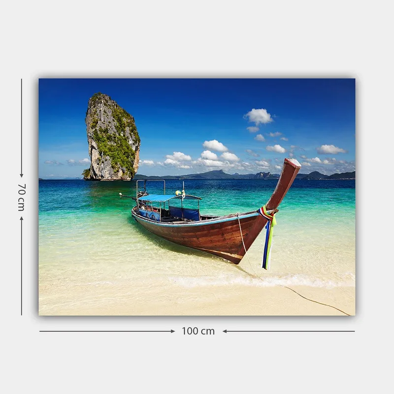Canvas taulu 70x100 cm - Perinteinen vene trooppisella rannalla, taustalla kivimuodostelmia - Sininen / Vihreä / Ruskea - Sisustustuotteet - Taulu & taide - Canvas-taulu