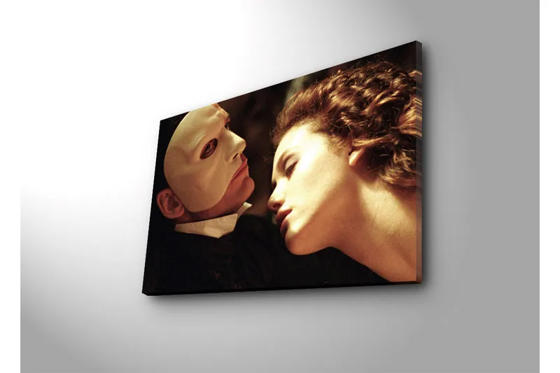 Canvas-taulu 70x45 cm - Kahden ihmisen välinen intensiivinen, tunteellinen kohtaus, jossa keskitytään naamioituneeseen mieheen ja naiseen - Ihonväri / Valkoinen / Musta - Sisustustuotteet - Taulu & taide - Canvas-taulu