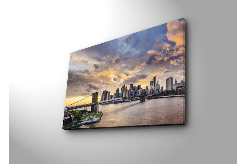 Canvas-taulu 70x45 cm - Kaupungin siluetti auringonlaskussa veden yllä - Sininen / Oranssi / Harmaa - Sisustustuotteet - Taulu & taide - Canvas-taulu