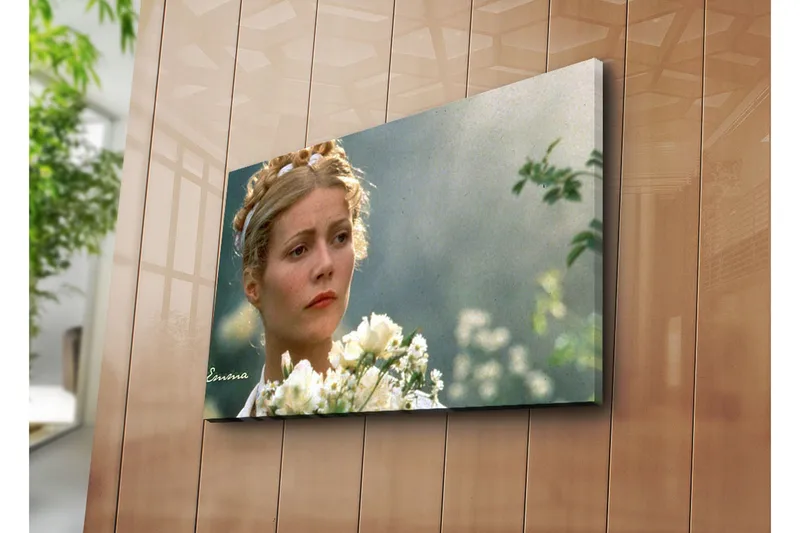 Canvas-taulu 70x45 cm - Nainen kukkien kanssa unelmaympäristössä, Vaaleanvihreä / Beige / Valkoinen