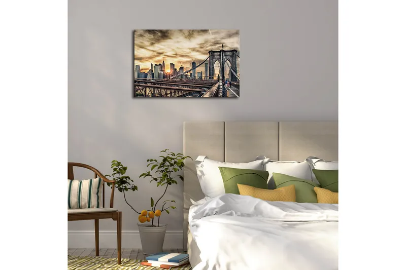 Canvas-taulu 70x45 cm - Upea näkymä Brooklyn Bridgelle ja taustalla kaupungin siluetti, Kulta / Harmaa / Sininen