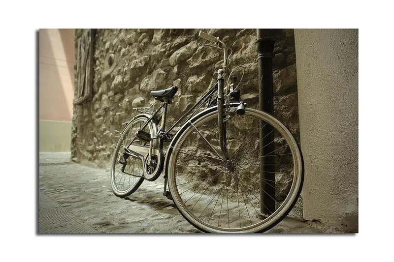 Canvas-taulu 70x45 cm - Polkupyörä nojaa kivimuuriin, Harmaa / Musta / Beige