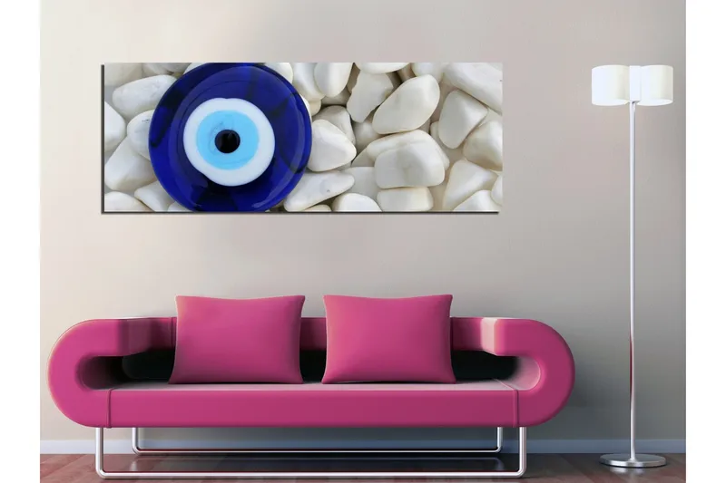Canvas-taulu 80x30 cm - Sinivalkoinen silmä valkoisten kivien taustaa vasten - Sininen / Valkoinen / Musta - Sisustustuotteet - Taulu & taide - Canvas-taulu