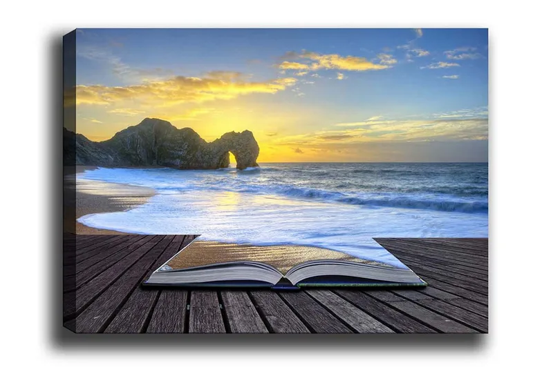 Canvas-taulu - Avoin kirja, taustalla ranta ja auringonlasku, Sininen / Kultainen / Beige