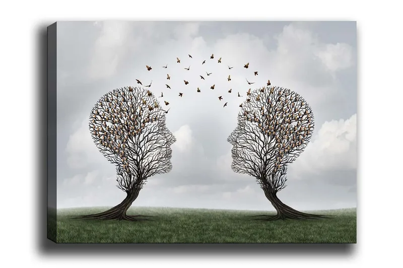 Canvas-taulu - Kaksi kasvojen muotoista puuta, joiden välissä leijuu perhosia, Ruskea / Vihreä / Harmaa