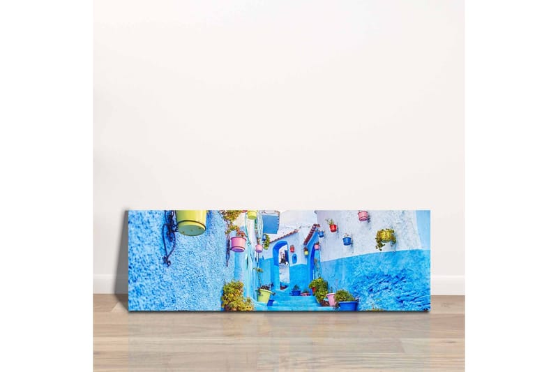 Canvas-taulu - Kaunis kuja sinisine seinine ja värikkäine kukkaruukkuineen - Sininen / Valkoinen / Keltainen - Sisustustuotteet - Taulu & taide - Canvas-taulu