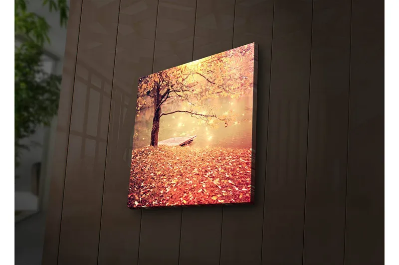 Canvas-taulu LED-valaistuksella 28x28 cm - Kaunis syysmaisema, jossa puu ja vene peilimäisen järven rannalla, Oranssi / Kulta / Ruskea