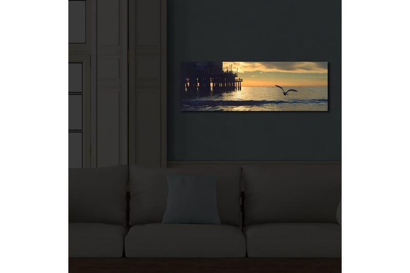 Canvas-taulu LED-valaistuksella 30x90 cm - Auringonlasku meren yllä lennossa olevan linnun kanssa - Oranssi / Sininen / Harmaa - Sisustustuotteet - Taulu & taide - Canvas-taulu
