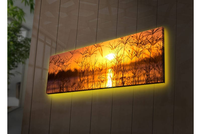 Canvas-taulu LED-valaistuksella 30x90 cm - Auringonlasku peilimäisen järven yllä, etualalla ruohoa - Oranssi / Kulta / Musta - Sisustustuotteet - Taulu & taide - Canvas-taulu