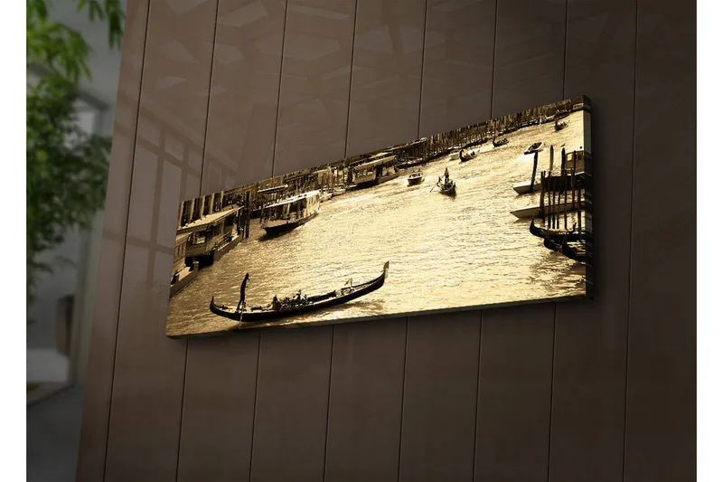 Canvas-taulu LED-valaistuksella 30x90 cm - Gondoli peilimäisellä kanavalla kaupunkiympäristössä, Kulta / Ruskea / Musta