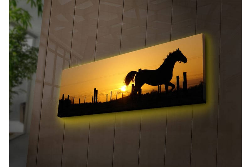 Canvas-taulu LED-valaistuksella 30x90 cm - Hevosen siluetti laukkaa auringonlaskun aikaan, Tummanruskea / Oranssi / Keltainen