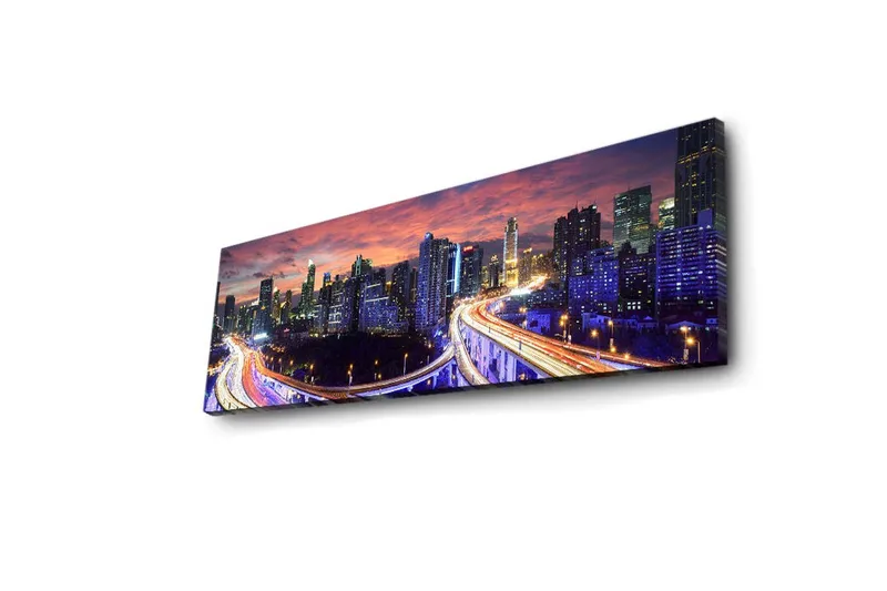 Canvas-taulu LED-valaistuksella 30x90 cm - Kaupungin siluetti hämärässä teiden valonsäteiden lumoissa - Tummansininen / Oranssi / Violetti - Sisustustuotteet - Taulu & taide - Canvas-taulu