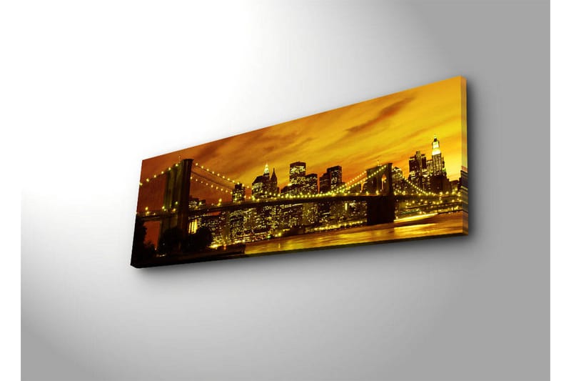 Canvas-taulu LED-valaistuksella 30x90 cm - Kaupungin siluetti ja silta auringonlaskun kultaisessa valossa - Kulta / Musta / Oranssi - Sisustustuotteet - Taulu & taide - Canvas-taulu