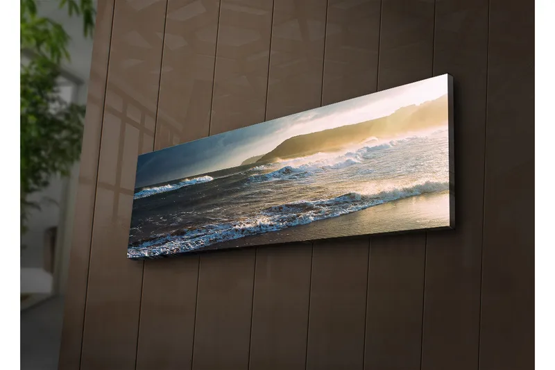 Canvas-taulu LED-valaistuksella 30x90 cm - Merimaisema aaltojen ja auringonlaskun kanssa, Sininen / Beige / Tummanvihreä