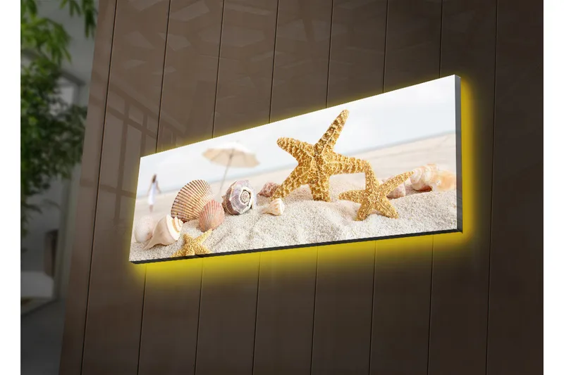 Canvas-taulu LED-valaistuksella 30x90 cm - Tähdenmuotoiset simpukat hiekkarannalla, Kulta / Beige / Vaaleanpunainen