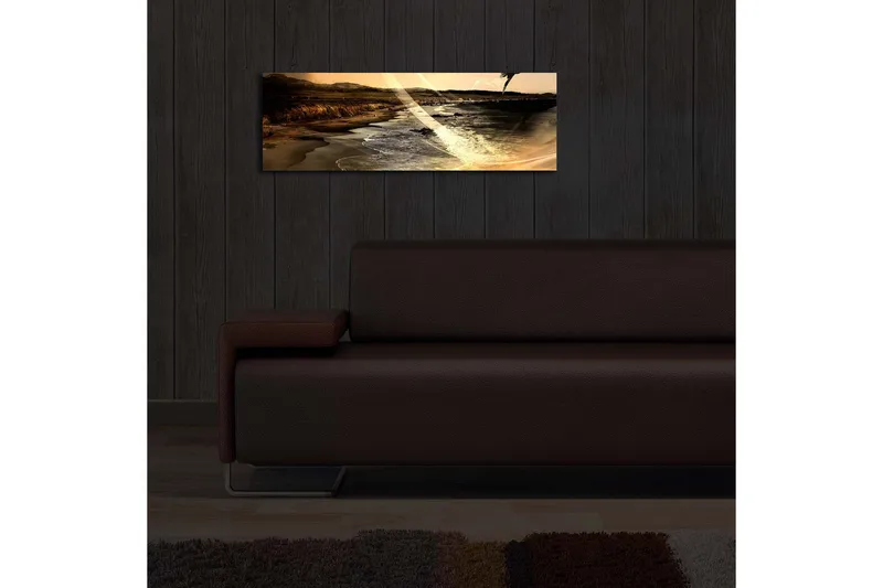 Canvas-taulu LED-valaistuksella 30x90 cm - Tunnelmallinen rantamaisema, jossa meri ja vuoret taustalla - Kulta / Ruskea / Musta - Sisustustuotteet - Taulu & taide - Canvas-taulu