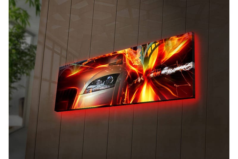 Canvas-taulu LED-valaistuksella 30x90 cm - Urheiluauto liikkeessä dynaamisilla valotehosteilla, Punainen / Oranssi / Musta
