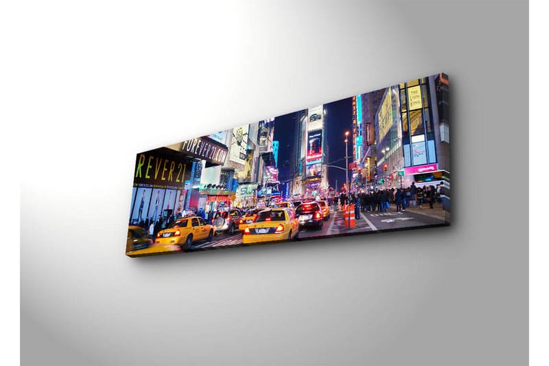 Canvas-taulu LED-valaistuksella 30x90 cm - Vilkas kaupunkikuva keltaisilla takseilla yöllisessä ympäristössä - Keltainen / Sininen / Musta - Sisustustuotteet - Taulu & taide - Canvas-taulu