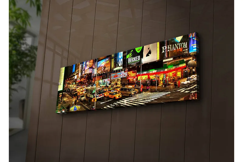 Canvas-taulu LED-valaistuksella 30x90 cm - Vilkas Times Squaren kaupunkikuva neonvaloilla ja liikenteellä, Keltainen / Vihreä / Punainen