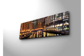 Canvas-taulu LED-valaistuksella 30x90 cm - Yöllinen kaupunkikuva heijastuksilla vedessä - Kulta / Sininen / Musta - Sisustustuotteet - Taulu & taide - Canvas-taulu