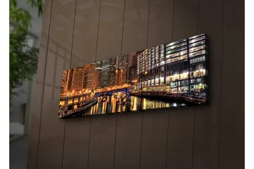 Canvas-taulu LED-valaistuksella 30x90 cm - Yöllinen kaupunkikuva heijastuksilla vedessä - Kulta / Sininen / Musta - Sisustustuotteet - Taulu & taide - Canvas-taulu
