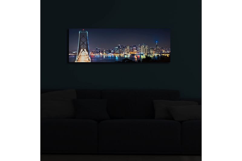 Canvas-taulu LED-valaistuksella 30x90 cm - Yöllinen kaupunkikuva sillalla ja pilvenpiirtäjien silueteilla - Tummansininen / Vaaleanvihreä / Valkoinen - Sisustustuotteet - Taulu & taide - Canvas-taulu