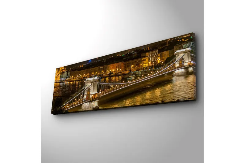 Canvas-taulu LED-valaistuksella 30x90 cm - Yönäkymä joen ylittävästä sillasta ja taustalla valaistuista rakennuksista - Kulta / Sininen / Musta - Sisustustuotteet - Taulu & taide - Canvas-taulu