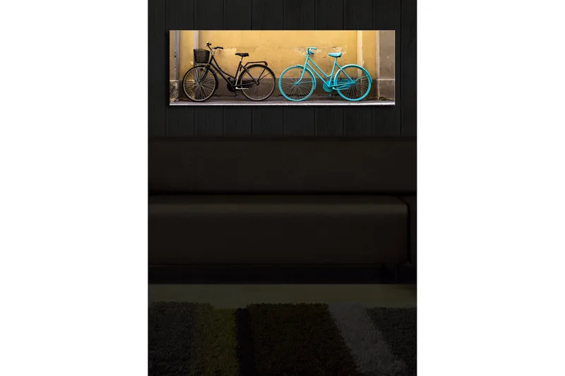 Canvas-taulu LED-valaistuksella 30x90 cm - Polkupyörät kontrastiväreissä keltaista seinää vasten - Musta / Turkoosi / Keltainen - Sisustustuotteet - Taulu & taide - Canvas-taulu