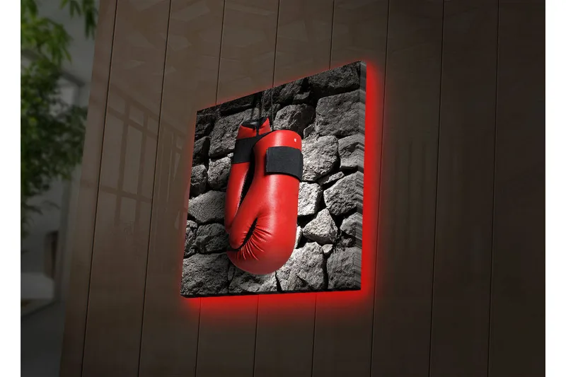 Canvas-taulu LED-valaistuksella 40x40 cm - Punaiset nyrkkeilyhanskat roikkuvat harmaata kiviseinää vasten, Punainen / Harmaa