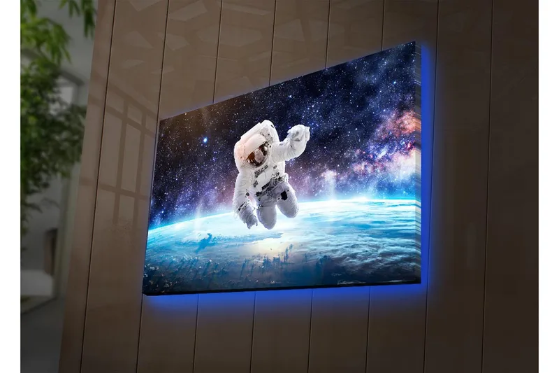 Canvas-taulu LED-valaistuksella 45x70 cm - Astronautti leijuu avaruudessa Maan yläpuolella - Valkoinen / Sininen / Musta - Sisustustuotteet - Taulu & taide - Canvas-taulu