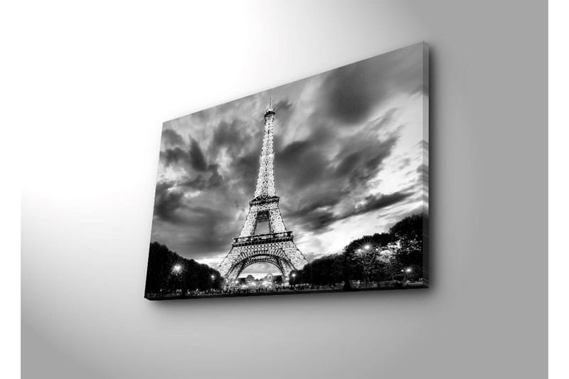Canvas-taulu LED-valaistuksella 45x70 cm - Dramaattinen mustavalkoinen valokuva Pariisin valaistuista Eiffel-torneista pilvisellä taivaalla - Musta / Valkoinen - Sisustustuotteet - Taulu & taide - Canvas-taulu