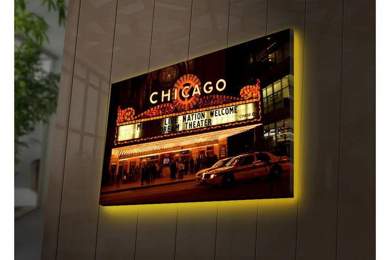 Canvas-taulu LED-valaistuksella 45x70 cm - Kirkas ja eloisa teatterijulkisivu Chicagossa, Kulta / Musta / Valkoinen