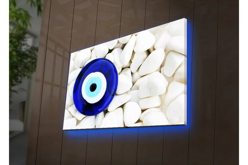 Canvas-taulu LED-valaistuksella 45x70 cm - Sininen silmä valkoisten kivien taustalla - Sininen / Valkoinen - Sisustustuotteet - Taulu & taide - Canvas-taulu