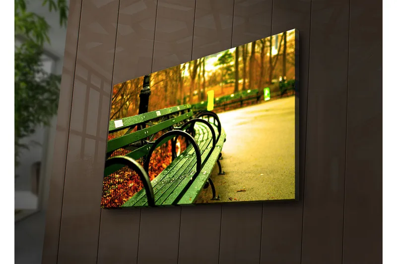 Canvas-taulu LED-valaistuksella 45x70 cm - Vihreä penkki syksyisessä puistoympäristössä, Vihreä / Keltainen / Ruskea