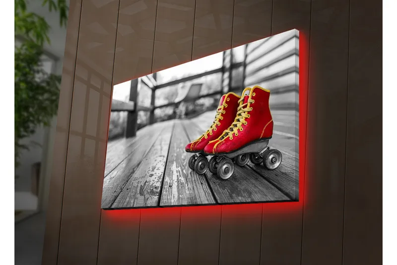 Canvas-taulu LED-valaistuksella 45x70 cm - Punaiset luistimet puisella radalla, Punainen / Keltainen / Harmaa